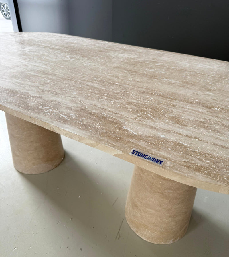 travertine dining table with two cylindrical legs, view 3