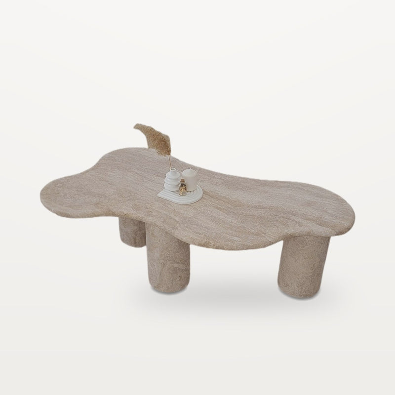 travertine coffee table with freeform top and four legs, view 2